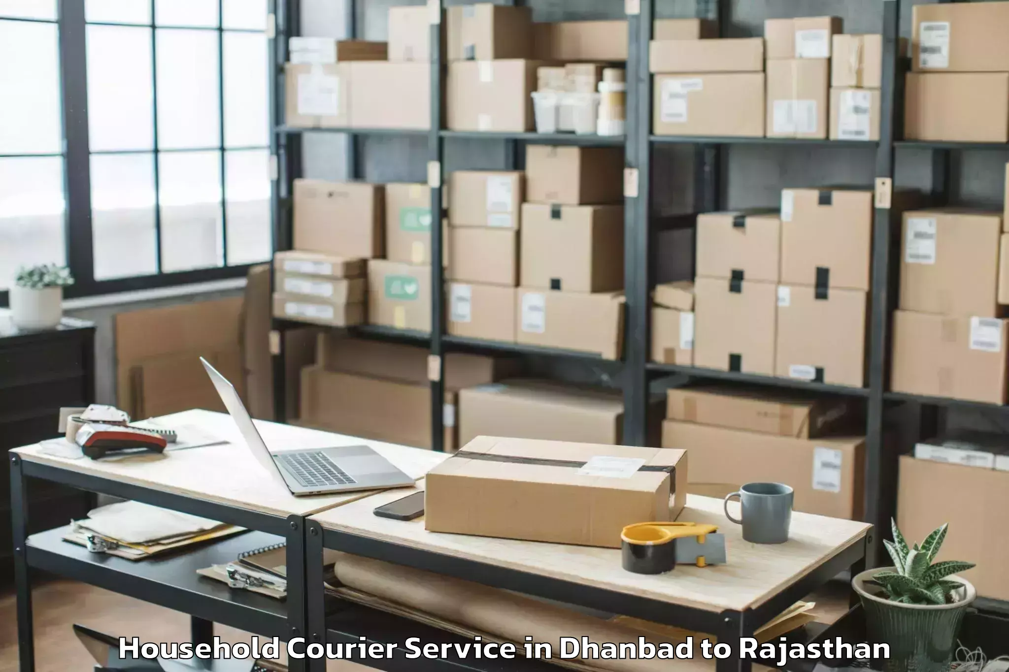 Hassle-Free Dhanbad to Sangaria Household Courier